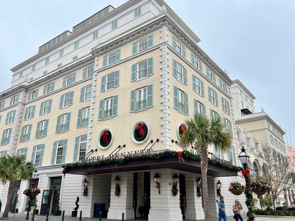 Hotel Bennett in Charleston, SC decorated for Christmas with lights and garland
