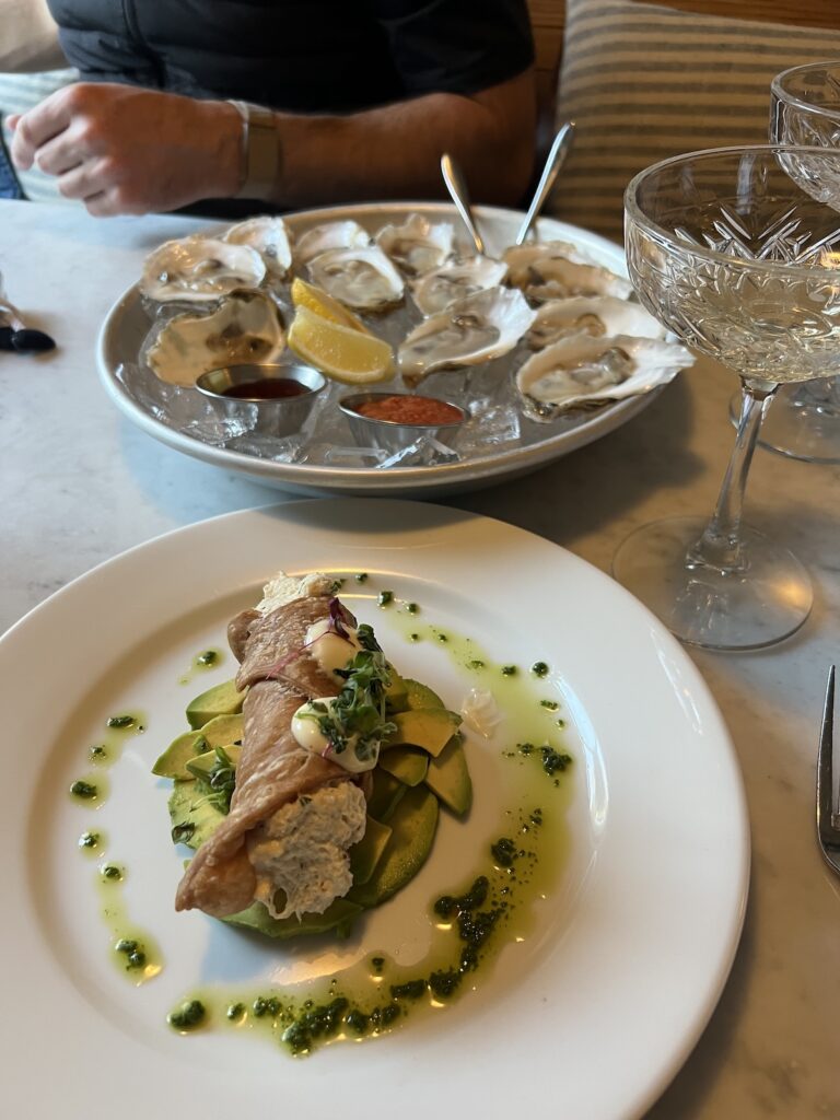 crab appetizer and oyster tray from post house. one of the best places to eat in charleston.