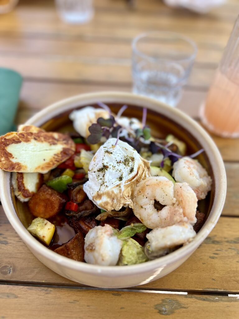 brunch at park and grove with bowl of veggies with poached egg and shrimp