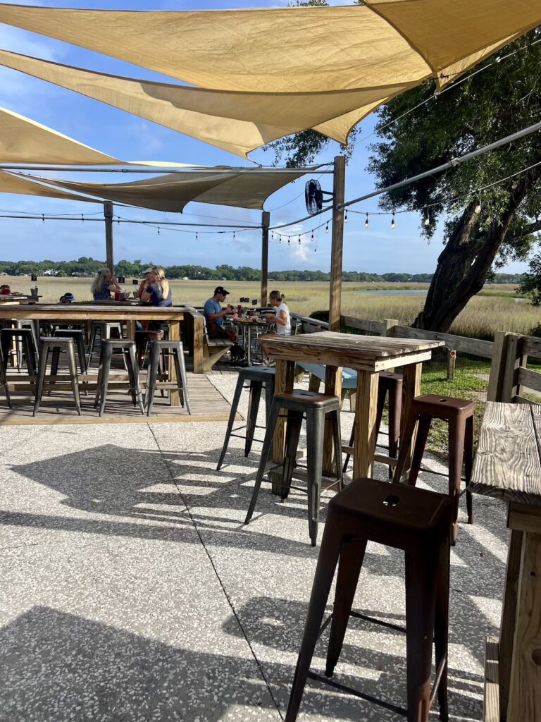ellis creek fish camp out door dining area. this is a hidden gem restaurant in charleston.